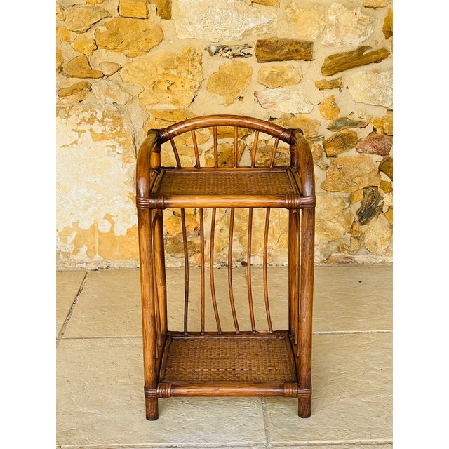 Mid-century,vintage, nightstand / side table circa 1970s piece has a structure made of bamboo with bent bamboo on the top...