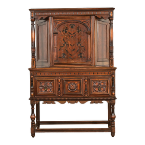 Berkey & Gay Antique English Tudor Carved Walnut and Burl Wood Bookcase or Bar Cabinet, Circa 1920s