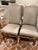 Vintage French Dining Chairs in the style of Os De Mouton, which translate to sheep's horn. Upholstered in a light gray...