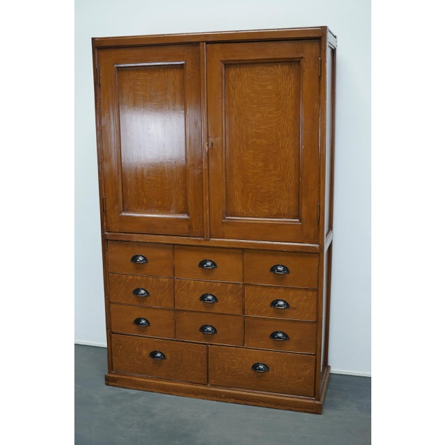 This cabinet of drawers was designed, circa 1920s in the netherlands and used in a monastery until a few years ago. The...