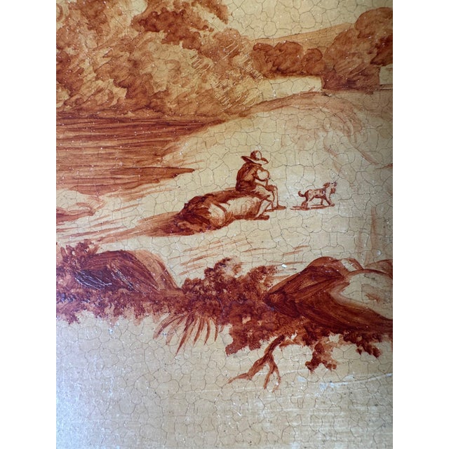 French metal handpainted tray. Rust colored paint on a yellow/gold tray. Small rim. 17”l x 12”w 49-129