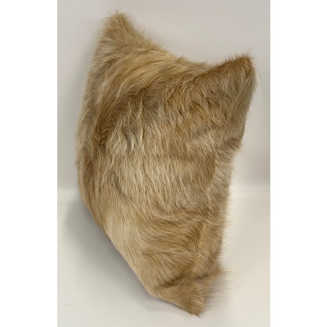Soft, luminous, and richly textured, this 18” x 18” pillow cover is crafted from premium long-haired Colombian cowhide in...