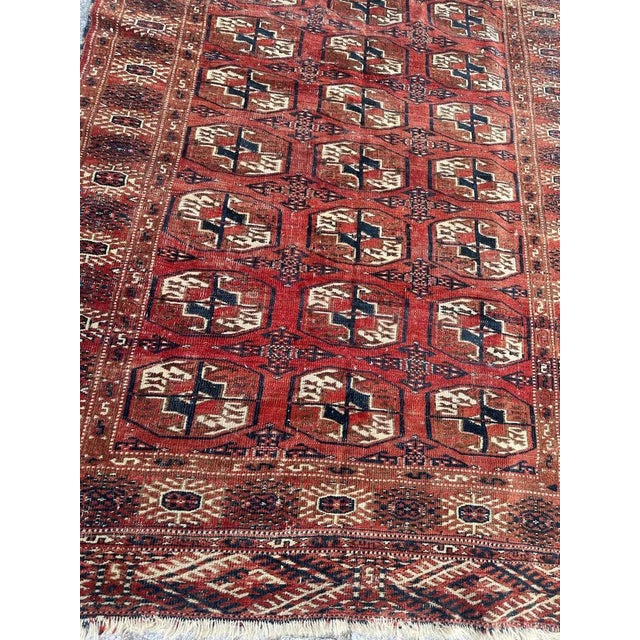 Discover an exquisite late 19th-century Turkmen Bokhara rug, boasting a captivating geometrical design and stunning...