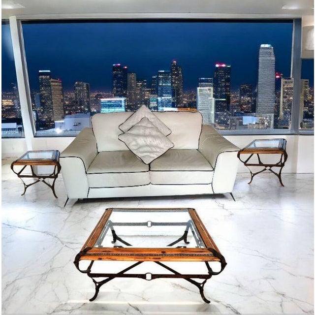 Bring the timeless elegance of the equestrian world into your home with this stunning Adnet Hermès style matching side...