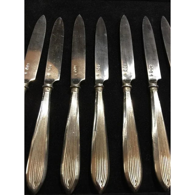 12 pieces rib model silver fruit knives, Netherlands, 1920 By Kempen & Zonen Fa. J.M. van 1858-1924, Voorschoten The...