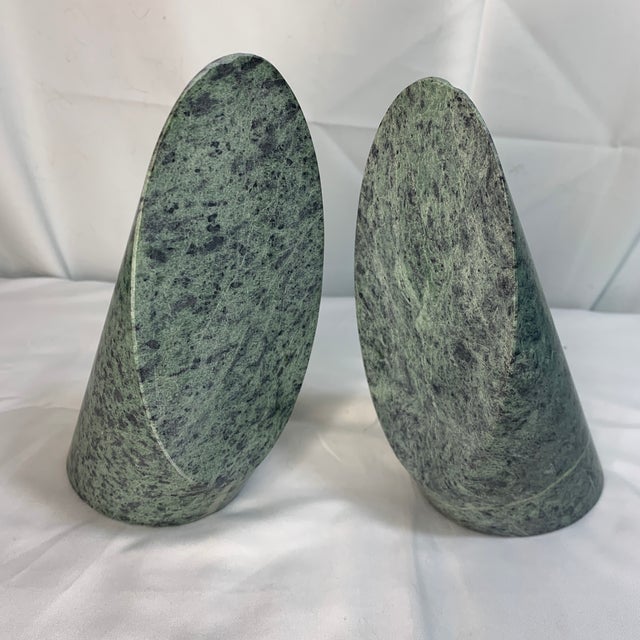 This item is a pair of vintage green marble bookends sculpted into minimalist, angled cylinder/cone forms. Pieces in this...