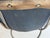Iron and leather dining arm chairs. Scroll detail. Scoop dip style seat. Use as a pair in living room or sitting area or...