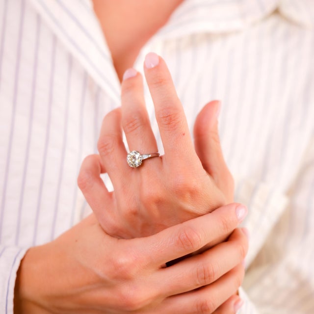 Certificate: GIA #2235410790 Center Stone: Old European Cut Diamond Weight: 3.46 Carat Color: N Clarity: SI1 Accent Stone:...