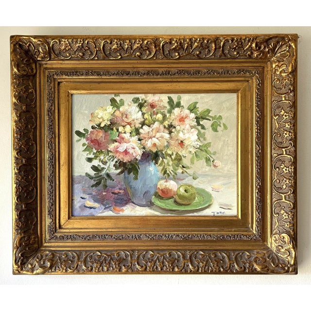 Late 20th Century Impressionist Floral Still Life oil painting on linen. The composition features a vibrant bouquet of...