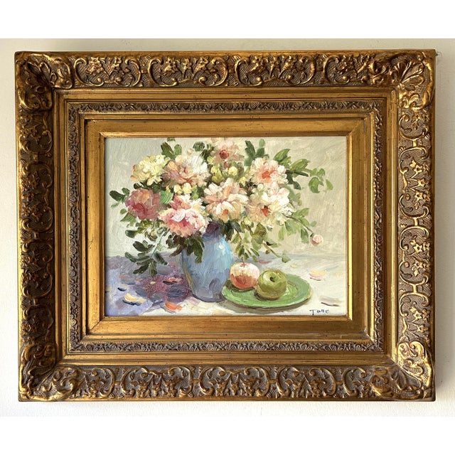 This late 20th century Impressionist Floral Still Life stands as a testament to both the artist's skill and the enduring...