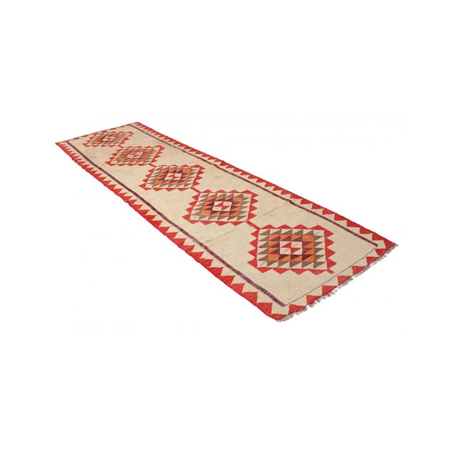 Vintage handwoven decorative kilim runner from Southeastern Turkey. Approximately 50-60 years old. In very good condition....