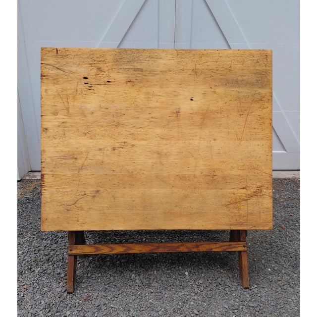 Vintage Hamilton Drafting Table signed on stretcher. The top is 48" x 37.5" and has been cleaned. The leg span is 26" x...