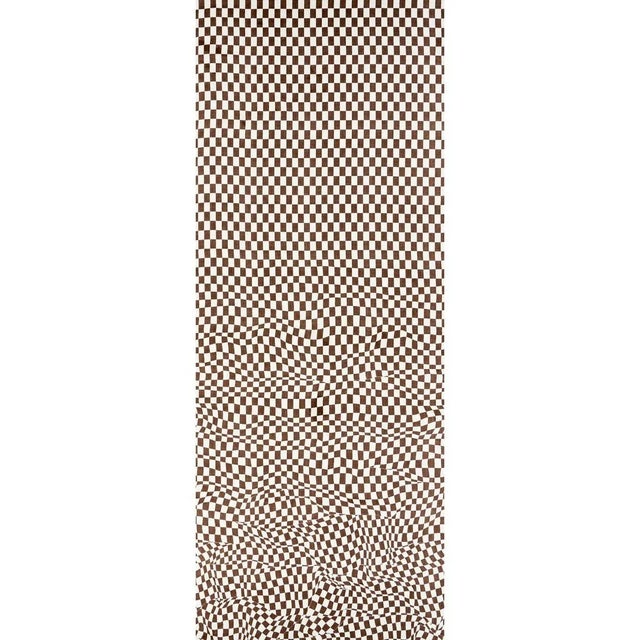 Loose Check Panel starts as a very regular check and descends into a beautiful illusion of bunched-up fabric. This David...