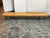 Design Plus Gallery presents a Vintage French Low Wood Table with Chrome Supports. The thick wood top has rounded corners,...