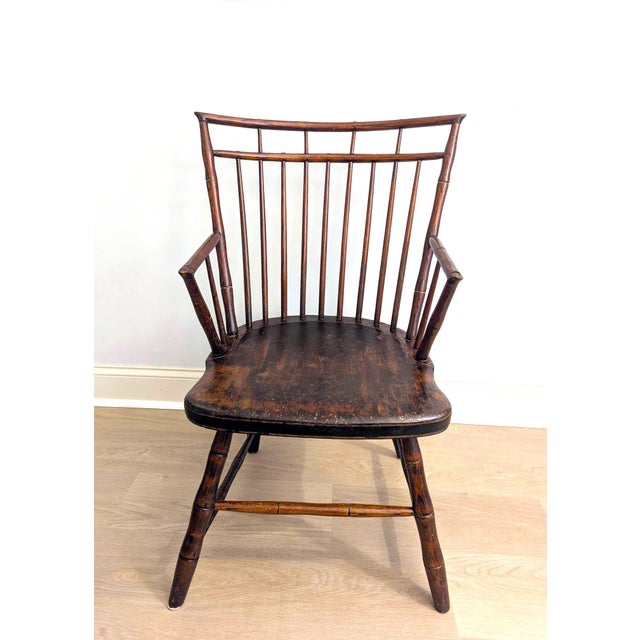 This is an exquisite, authentic American Federal style Windsor arm chair, estimated to be from the late 18th century or...