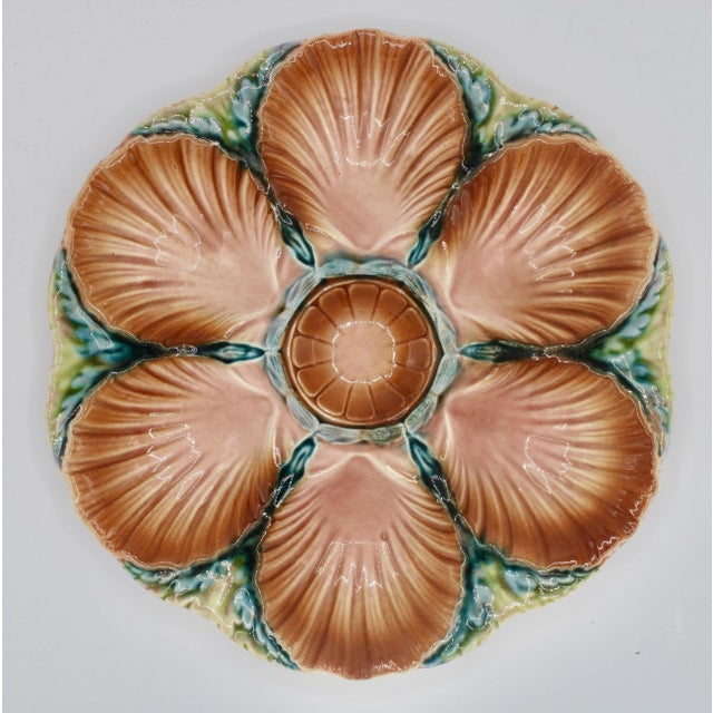A stunning Art Deco style French oyster plate with lovely shades of blue, green and peach. With a unique geometric shape,...