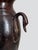A beautifully restrained early 19th-century French patinated bronze vase in the Neoclassical tradition of the Empire and...