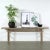 Crafted from a single slab of solid elmwood, this extra-large vintage console table showcases expressive wood grain, warm...