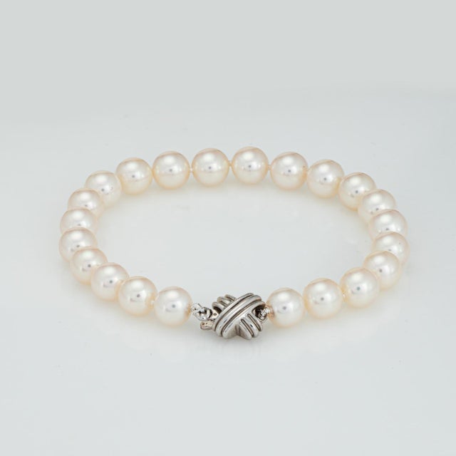 Stylish and finely detailed estate Tiffany & Co pearl bracelet from the 'Signature' pearls collection, finished with an...