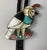 Zuni 1950's Bolo tie/necklace in shape of Gambel's Quail. Inlay of mother of pearl, onyx, turquoise, coral, and shell on...