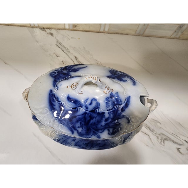 This beautiful bowl shows signs of age in the nicest of ways. Beautiful crackling patina from over a century of serving up...