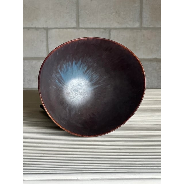 A well sized decorative bowl designed by Gunnar Nylund. Iconic form with great movement reminiscent of Swedish modern...