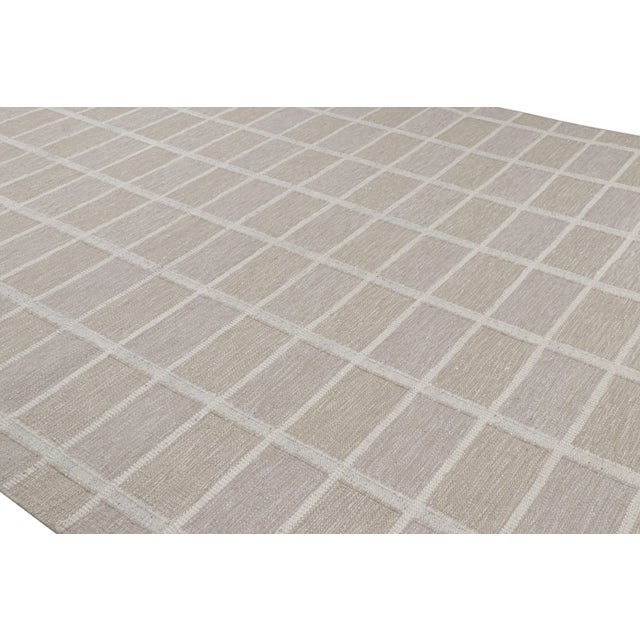 This 10x14 Scandinavian kilim, hand woven in wool, from our celebrated flat weave texture of the titular, award-winning...