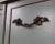 Sets of three vintage French Provincial-style bail pull, featuring a cast metal construction with an antiqued finish,...