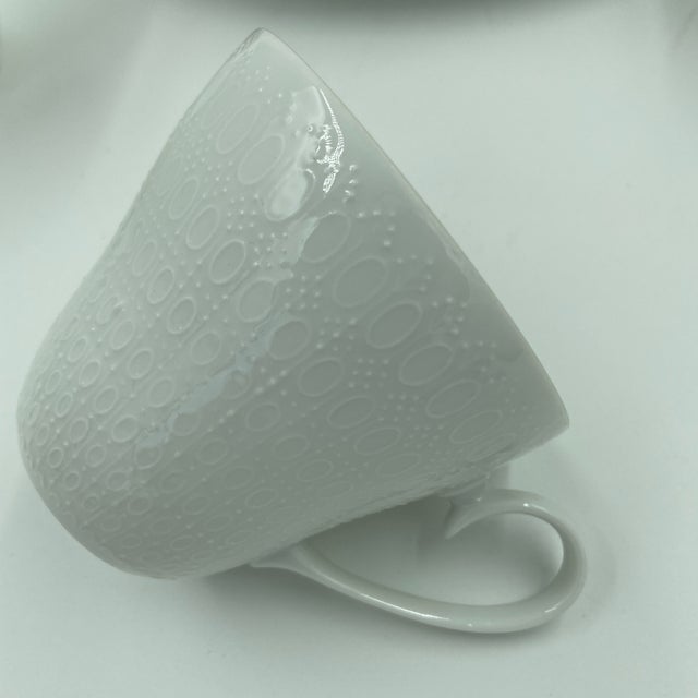 Four Place Settings Assembled From Two Period Rosenthal Production Runs of the Same Bjørn Wiinblad "Motif" Studio Linea...
