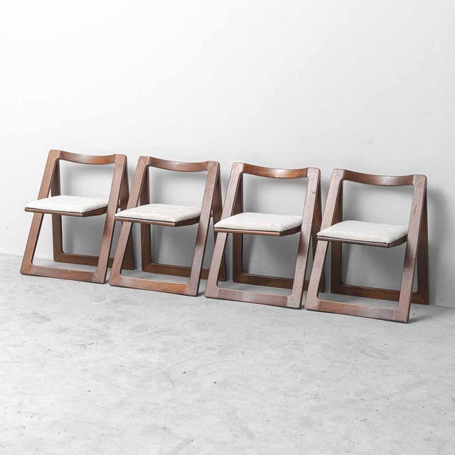Set of 4 chairs, Trieste model by Jacober & Bazzani. Wooden frame and fabric seat. Good condition. Marks as shown in...