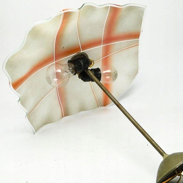 The umbrella-shaped pendant lamp was produced in Poland in the 60s. It is preserved in good condition, has traces of...