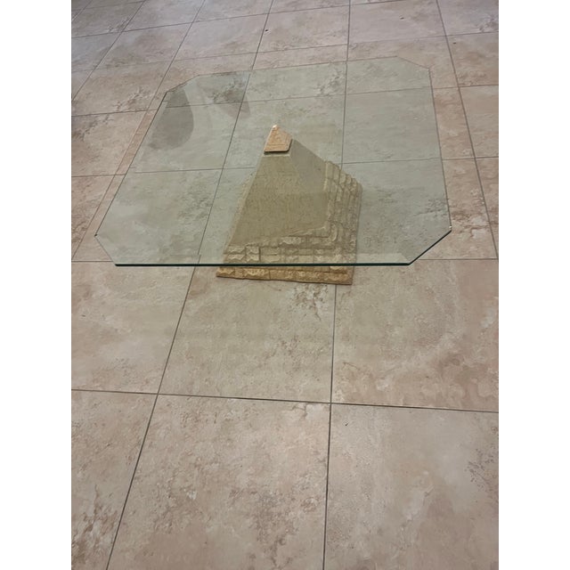 This is such a cool table! This is a vintage Postmodern Travertine Pyramid Coffee Table. It is a classic Italian design...