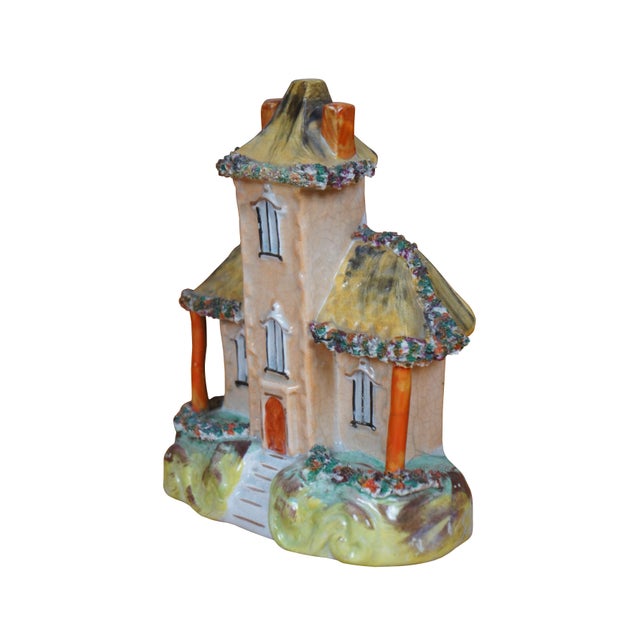 Antique 19th century Staffordshire porceain flatback figurine in the shape of a brown stone manor house with tall central...