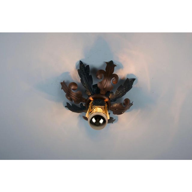 One of two florentine-style flower flush mounts by kaiser, germany, 1960s. This decorative ceiling light is arranged like...
