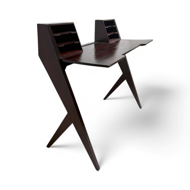 Elegant Gio Ponti style rosewood desk from the 1950s. This is an emblematic and innovative piece of mid-20th century...