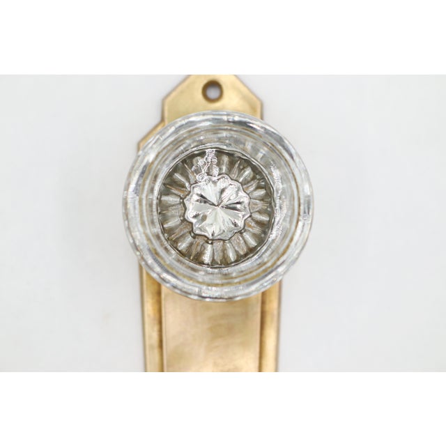 Great condition. One keyhole area has bends. One plate is made of brass and one plate is made of steel. The manufacturer...