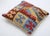 A one-of-a-kind handwoven Afghan wool kilim accent pillow featuring bold geometric patchwork blocks. Cut and sewn by hand...