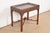 An exceptional Chippendale or Georgian style carved mahogany occasional side table or tea table By Kindel Furniture USA,...