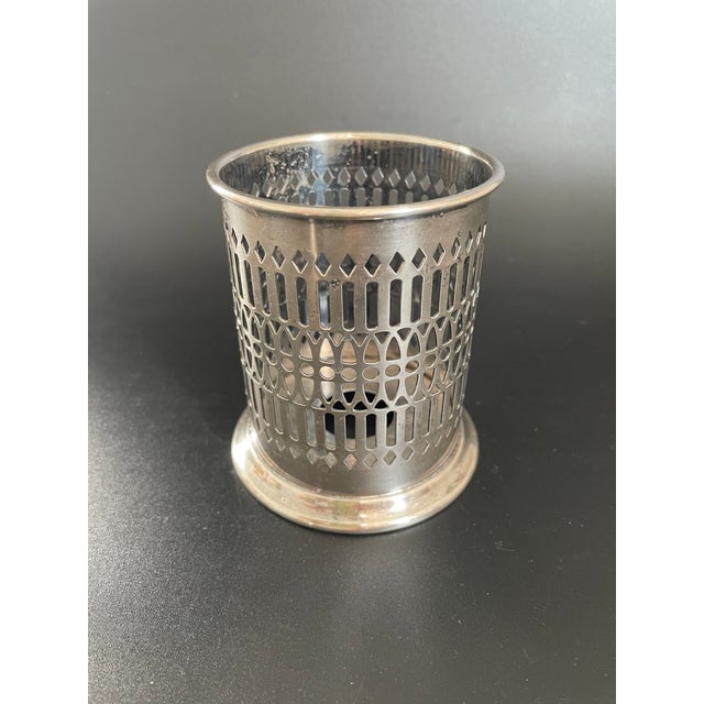 This vintage pierced jar holder by Sheffield Silver Co. makes a versatile addition to your vanity or bath, ideal for...