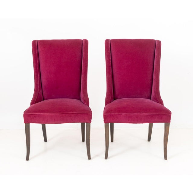 Pair of Plum Velvet Upholstered Side Chairs, each on four wood legs. 40.75" H x 24.5" W x 24.5" D; seat: 17.75" H....