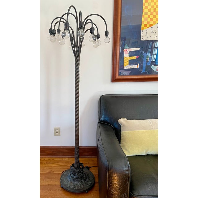 This gorgeous art nouveau Tiffany-style floor lamp is a beautiful homage to the original. The original Tiffany studio...