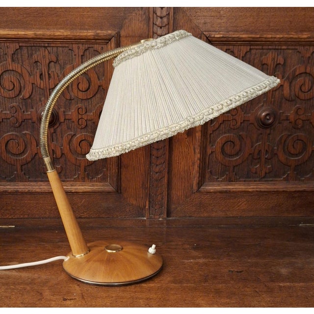 Mid-Century Adjustable Walnut Table Lamp with Brass Fittings and Fabric Shade from Temde, 1960s, in Very Good conditions....