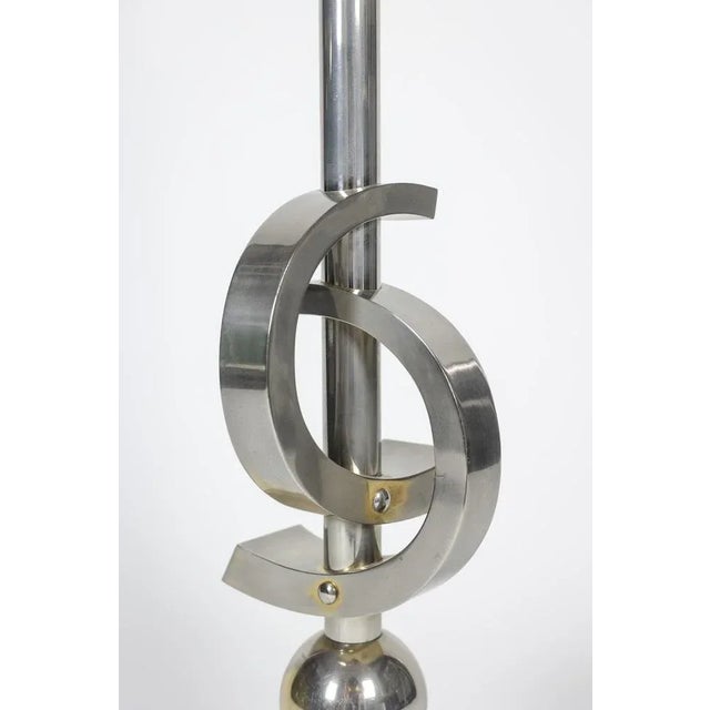 Sculptural lamp in chromed metal, geometric and abstract shape. Hexagon base. French work realized in the 1970s. This...