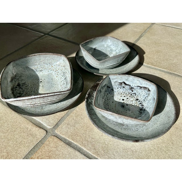 This studio ceramic set of three bowls and three plates is characteristic of the Serocka ceramic workshop, with its...