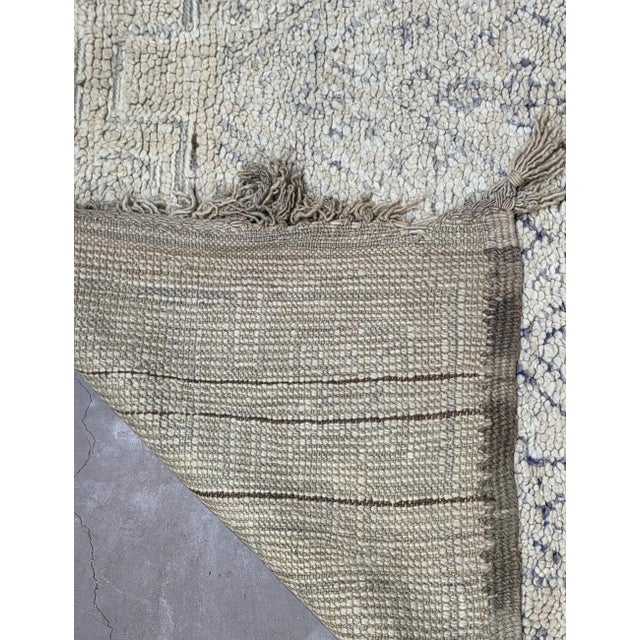 Neutral Beni M'Guild Rug | Handwoven Wool Rug with Diamond Lattice &amp; Cross Motifs This neutral Beni M'Guild rug builds...