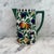 Antique Art Nouveau Villeroy Boch Wallerfangen Saar Basin pitcher. Decorated with a vibrant stylized fruit and foliage...