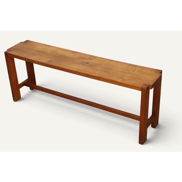 Model S09 bench designed by Pierre Chapo, French production from the 1970s. Made of solid elm, this bench perfectly...