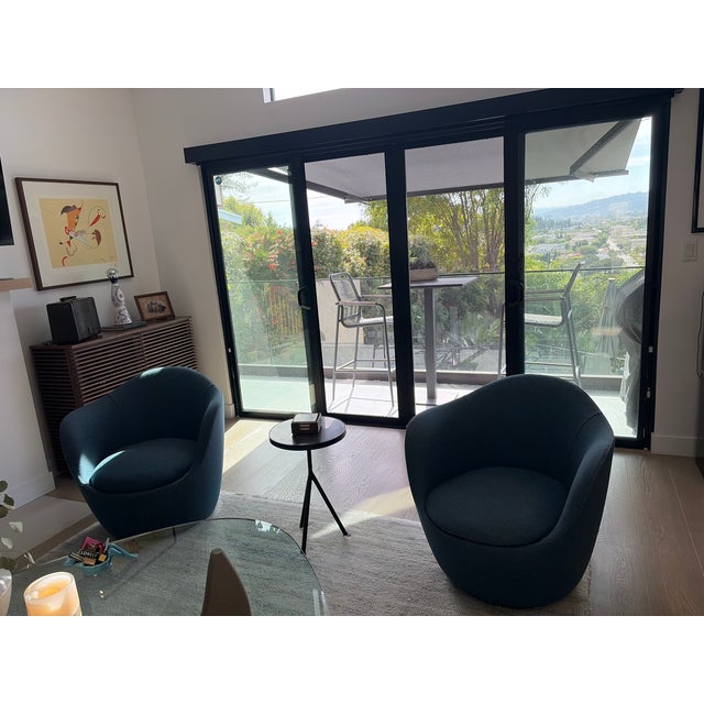 Bought these from Design Within Reach last year. Lina Swivel Chairs by Hlynur Atlason, selling as a set. Open to offers....