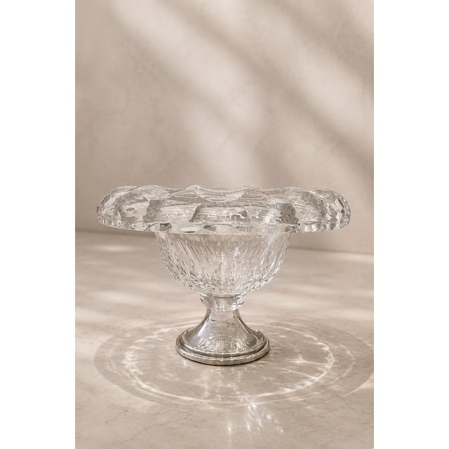 Refined centrepiece on a pedestal made in the netherlands in the mid-20th century. The piece bears the signature of c.j....