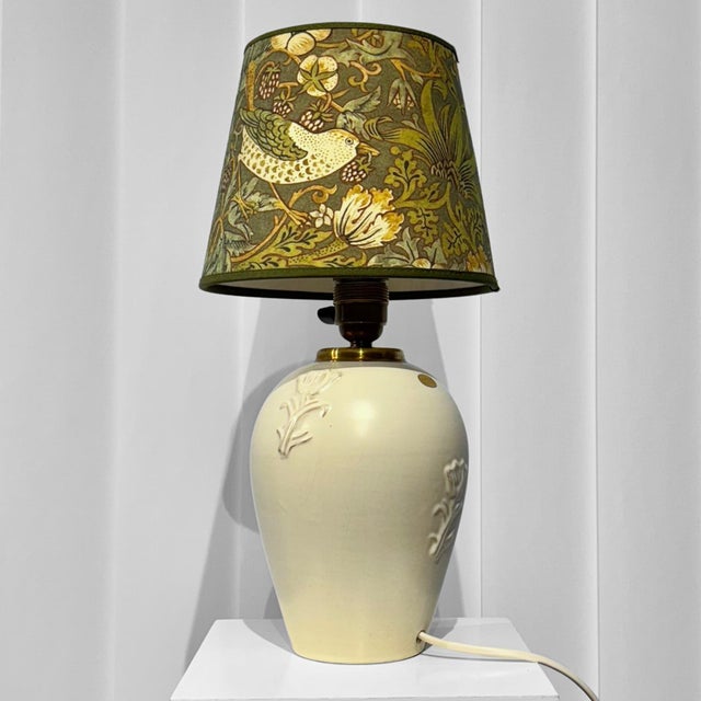 An exquisite table lamp designed by Jerk Werkmäster circa 1940 for the Swedish ceramics studio Nittsjö. The base is...